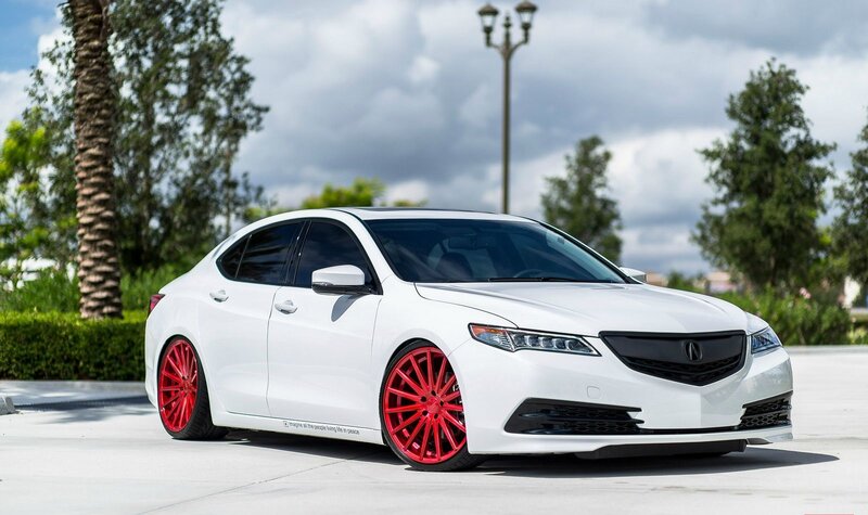 White Sedan Car — Calm, Afternoon, Photograph, Red Wheels