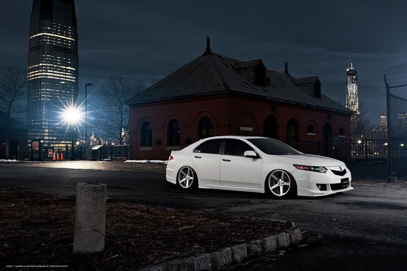 White Sedan Car — Dramatic, Night, Photograph, Brick Building