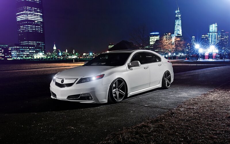 White Sedan Car — Dramatic, Night, Photograph, City Skyline