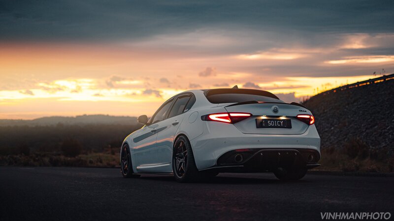 White Sedan Car — Dramatic, Sunset, Photograph, Road