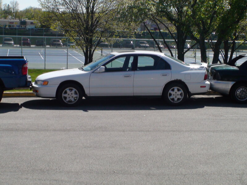 White Sedan Car — Gray