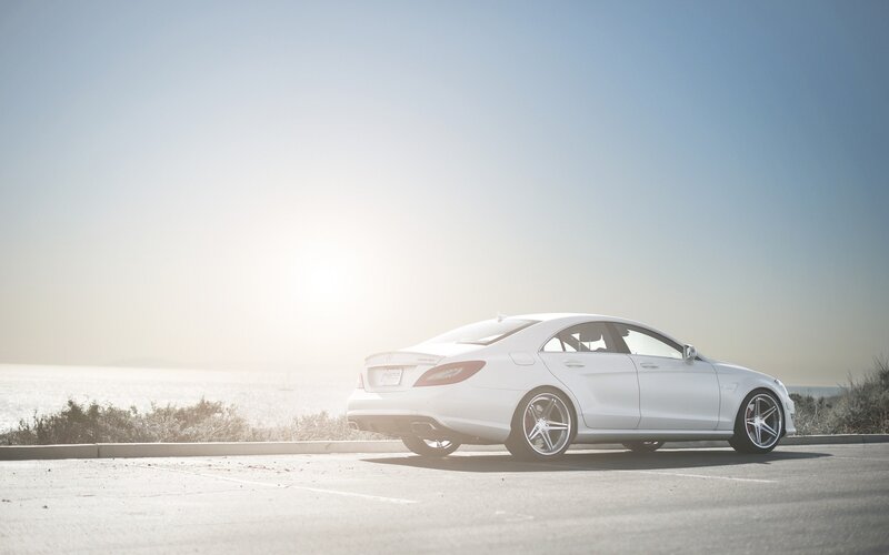 White Sedan Car — Serene, Afternoon, Photograph, Sea