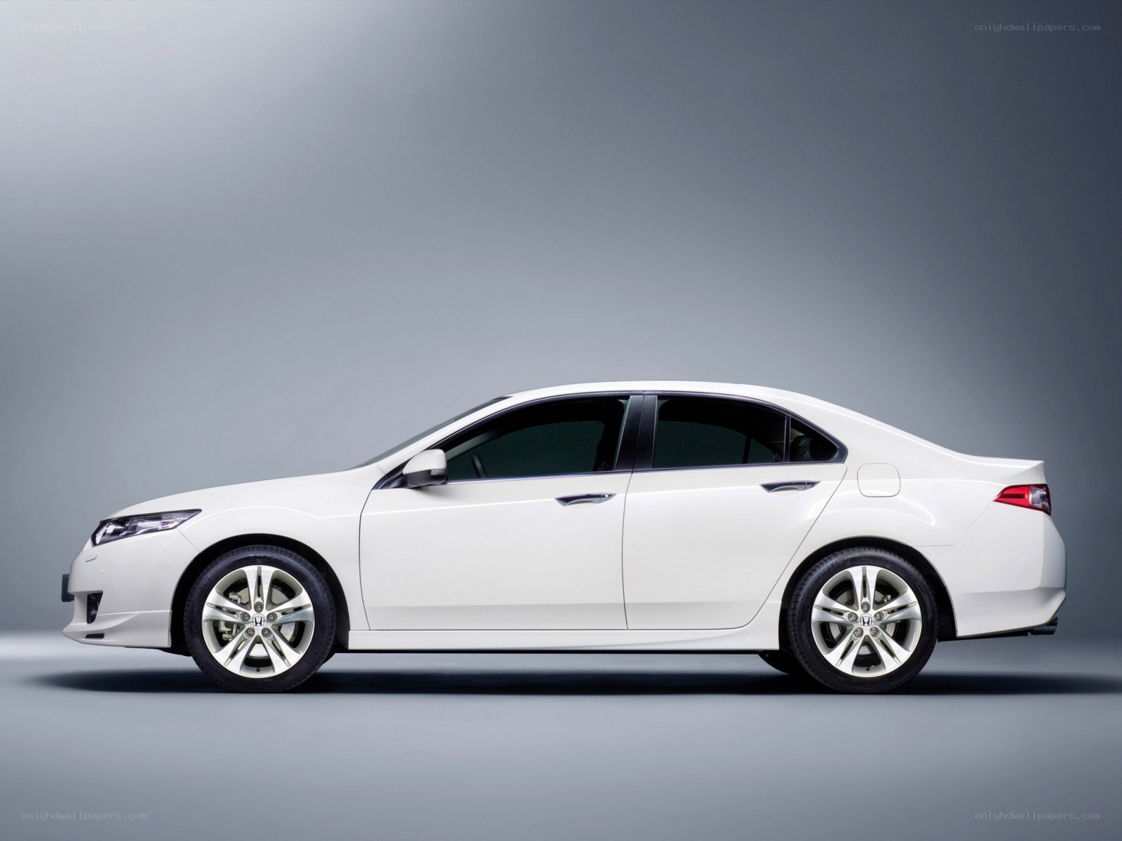 white sedan car side view