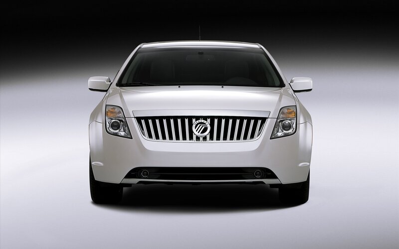 white sedan front view