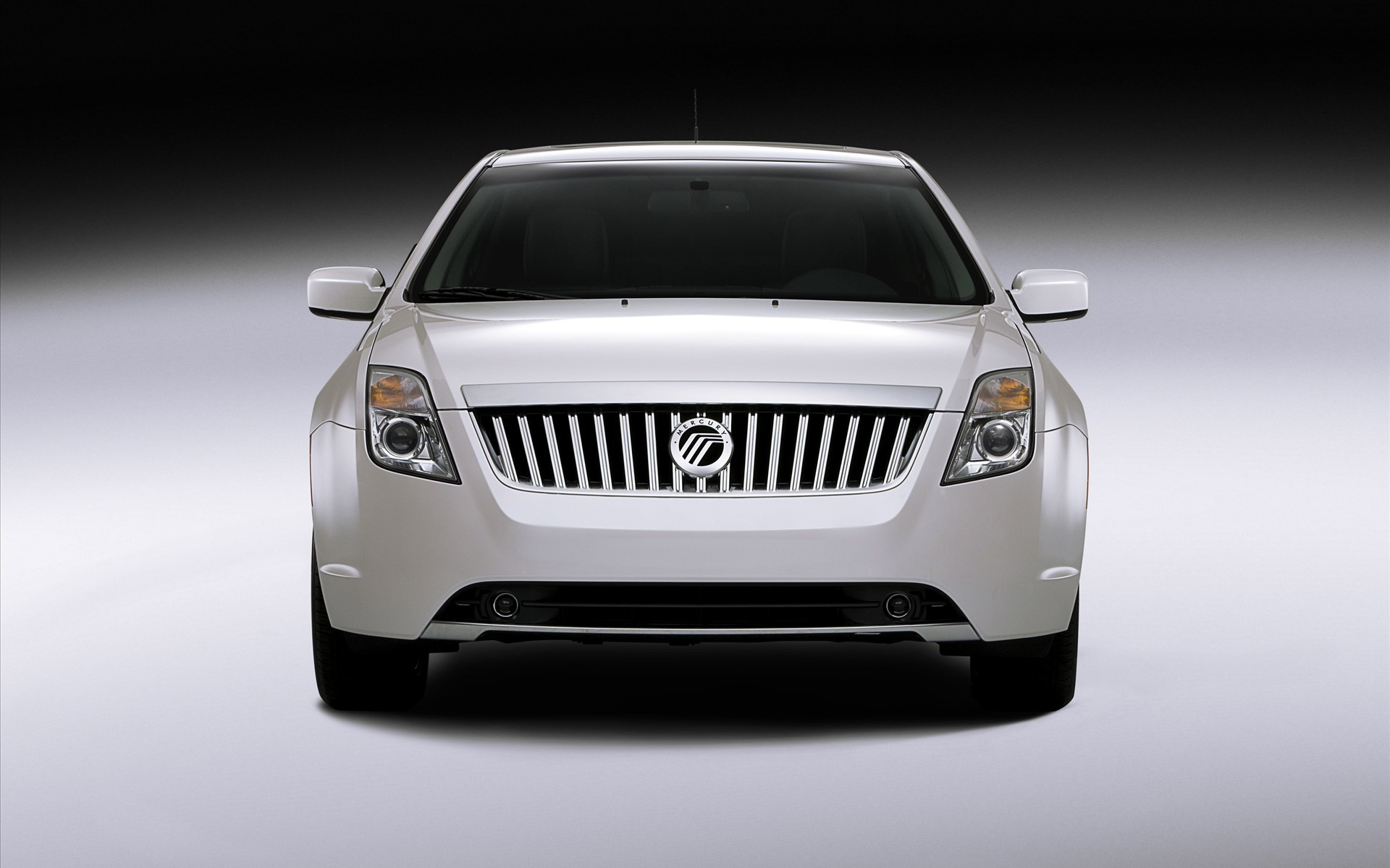 white sedan front view