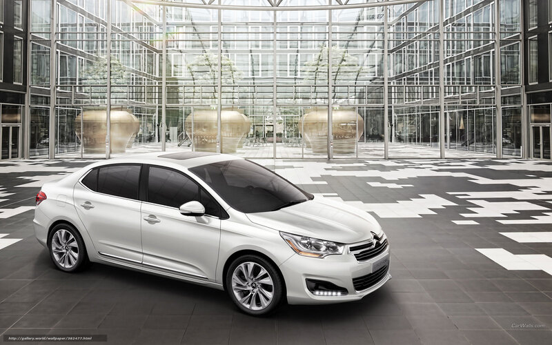 White sedan in modern atrium