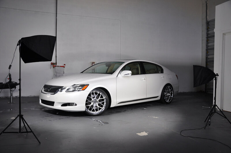 white sedan in photo studio