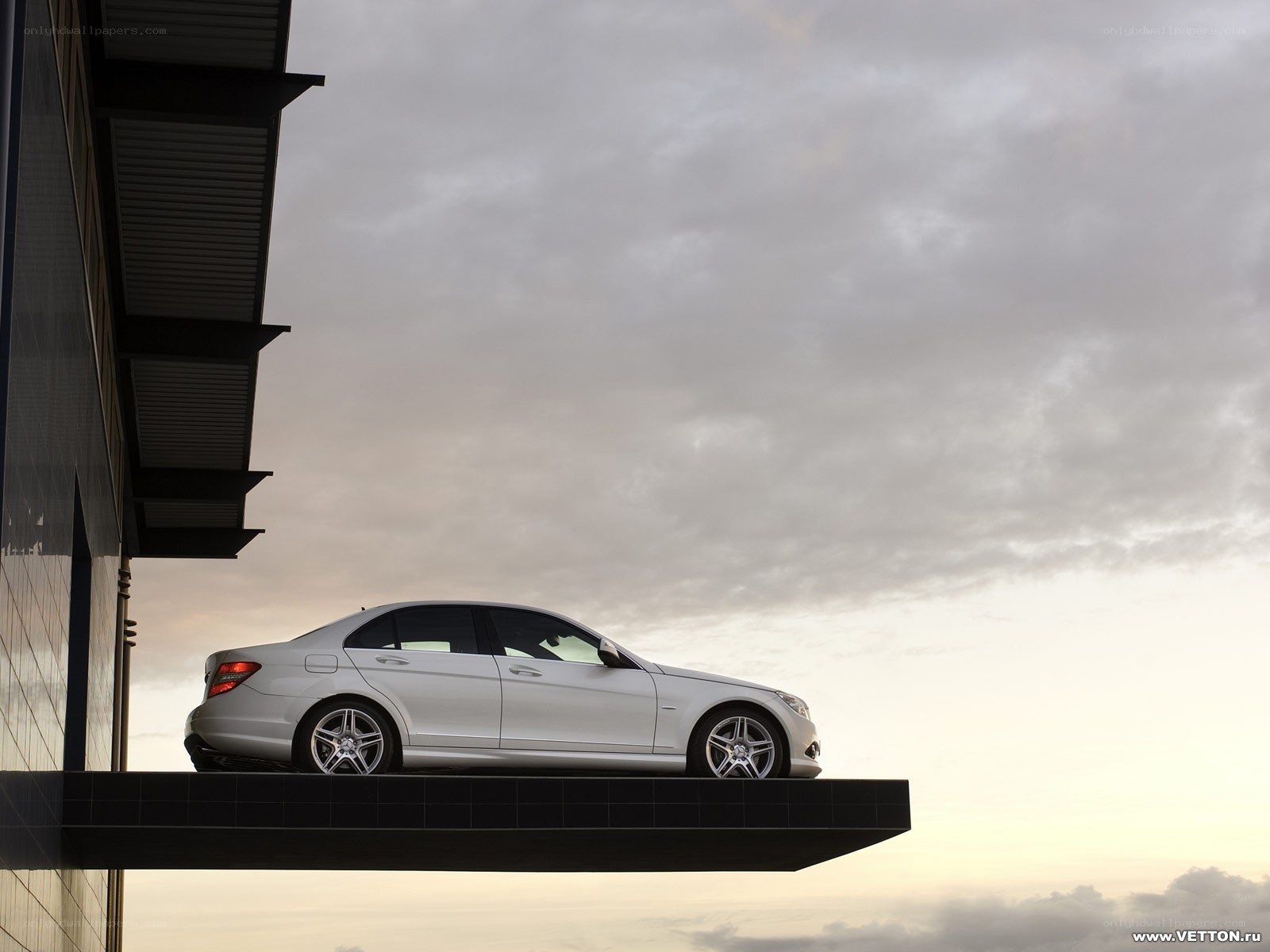 White sedan on a balcony