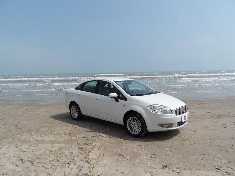 White Sedan on Beach — Serene