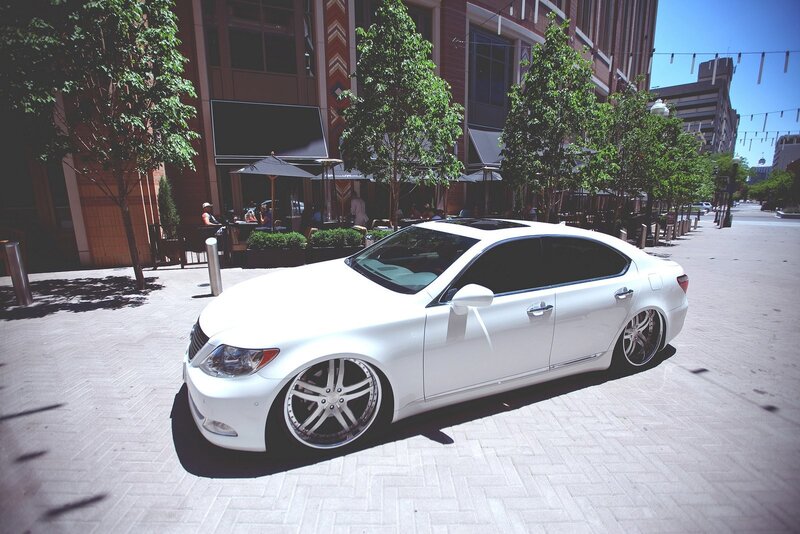 white sedan on city street