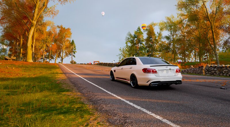 White Sedan on Road — Serene