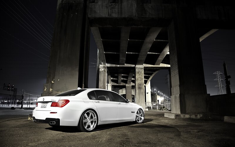 White Sedan under Bridge — Dramatic
