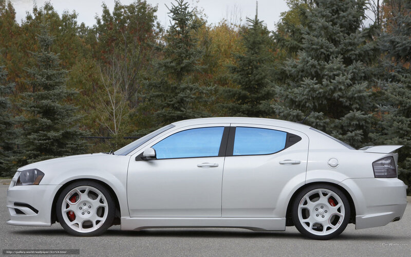 white sedan with performance wheels