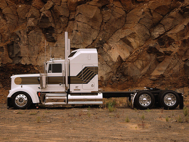 white semi-truck in rocky area