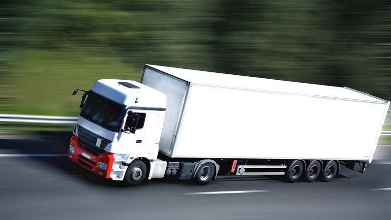 White Semi-truck on Road — Dynamic
