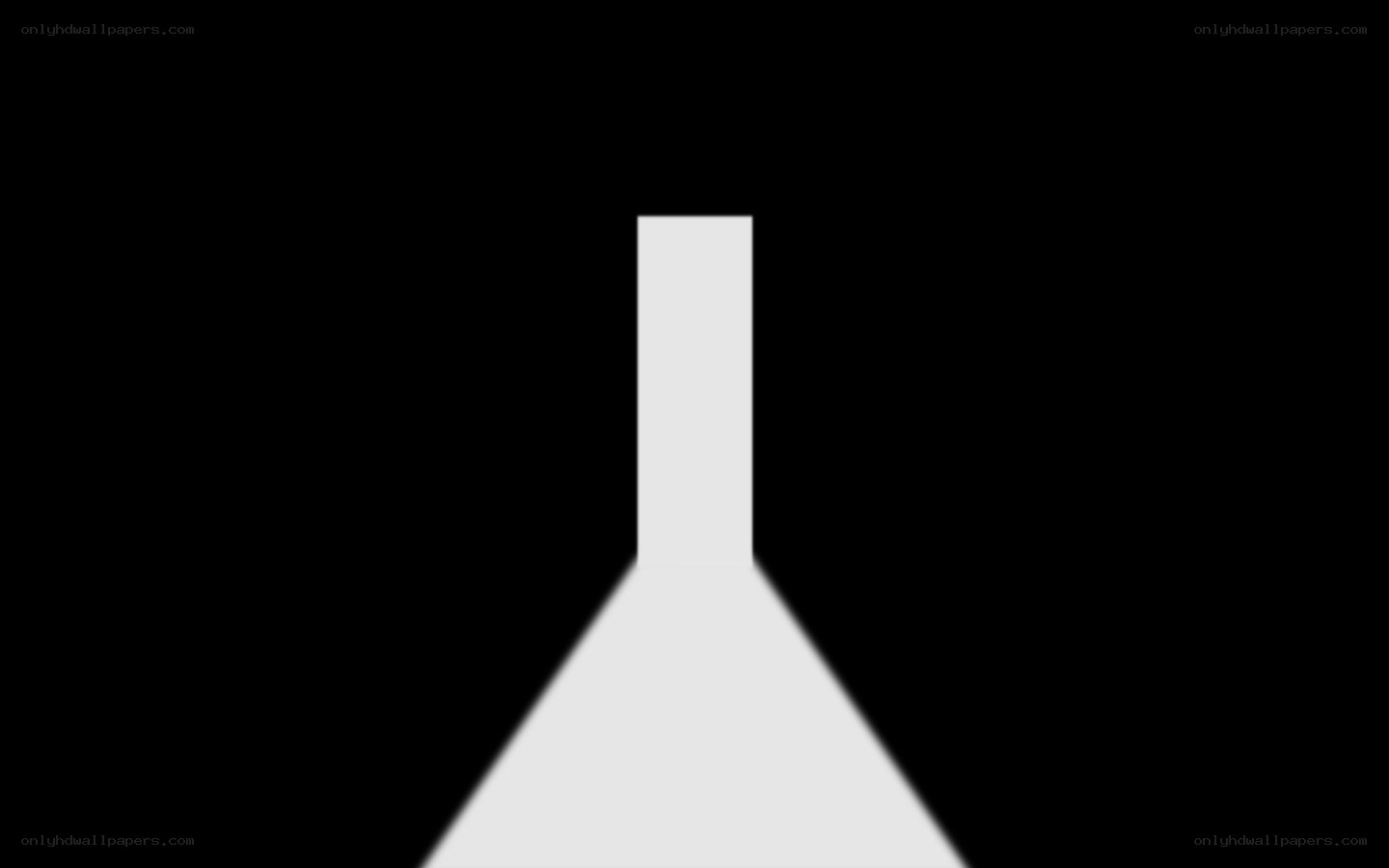 white shape on black background