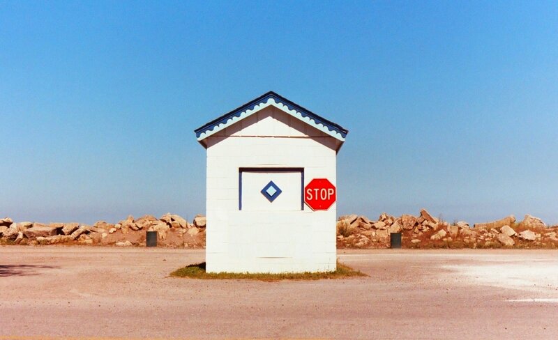 White Shed with Stop Sign