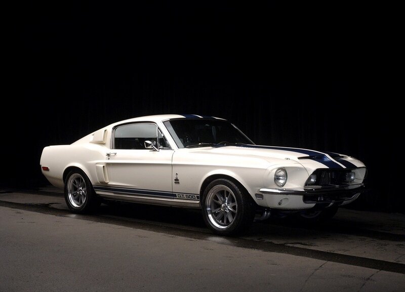 white Shelby GT500 muscle car