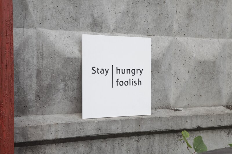 White Sign on Concrete