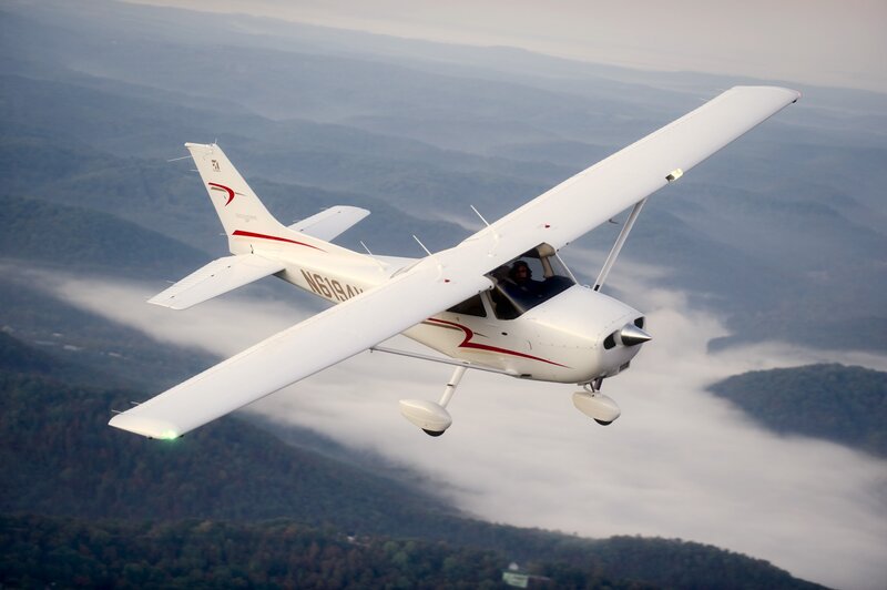 White Single-engine Plane — Serene