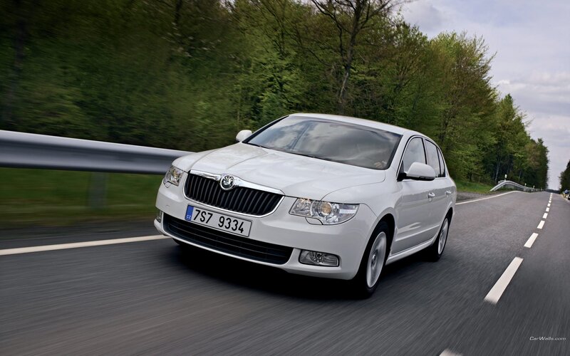 white skoda on a road