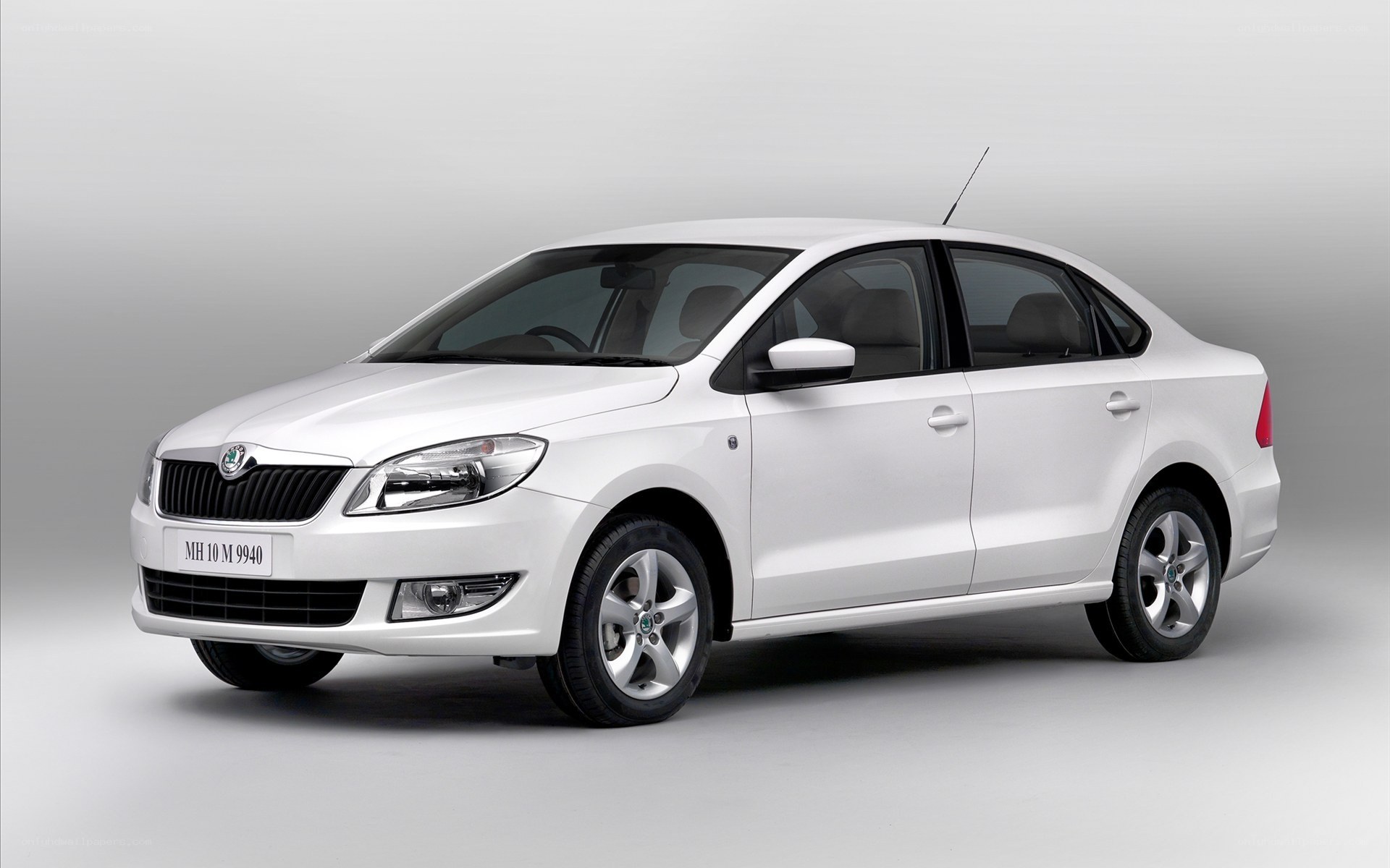 white skoda sedan car