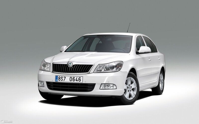 white skoda sedan car