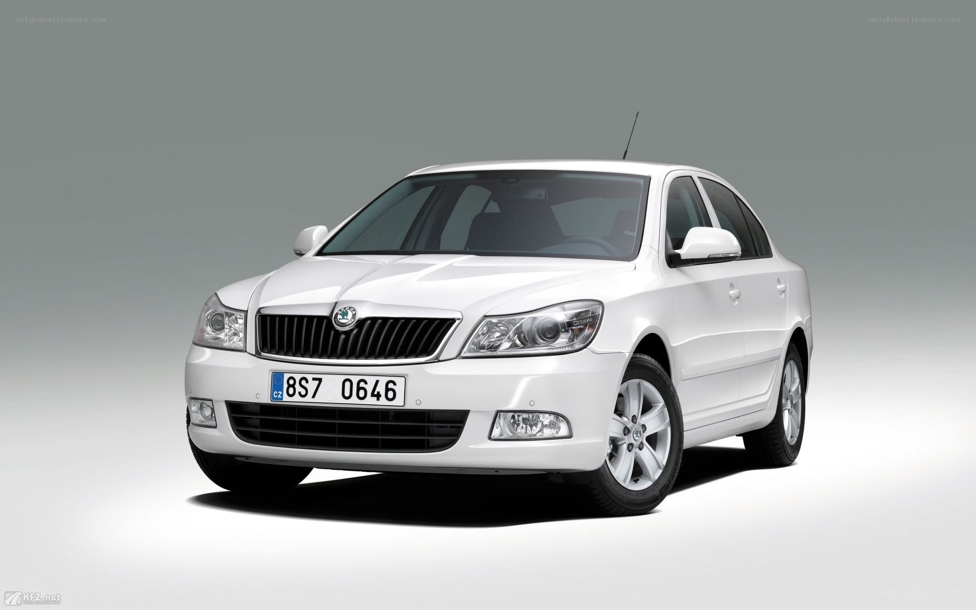 white skoda sedan car