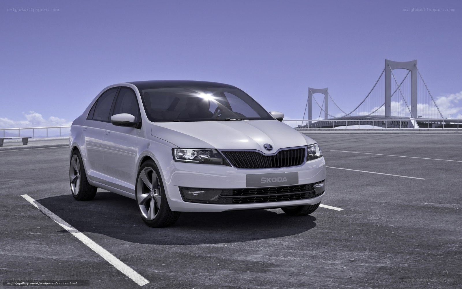 White Skoda sedan on bridge