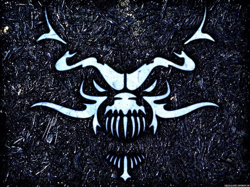 white skull logo on dark background