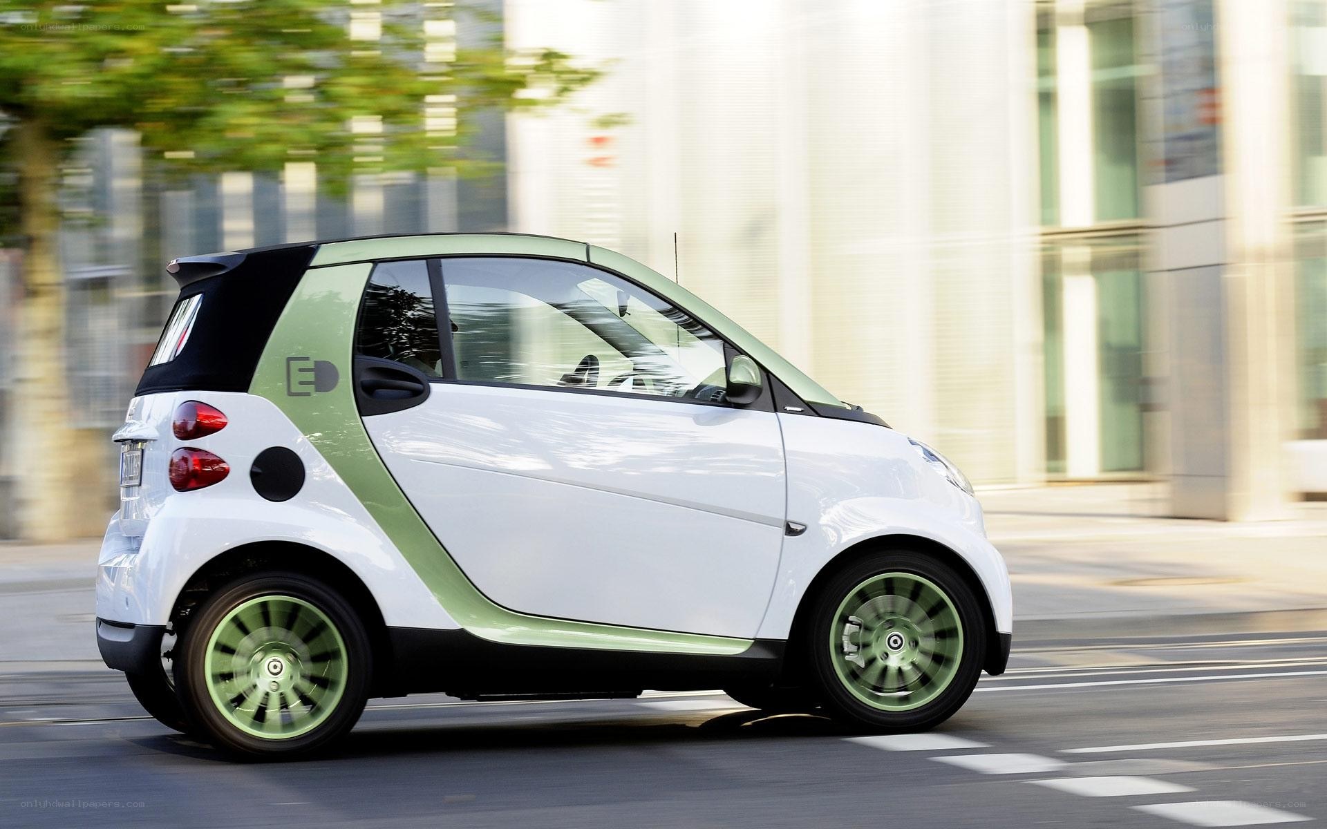 white smart car in motion
