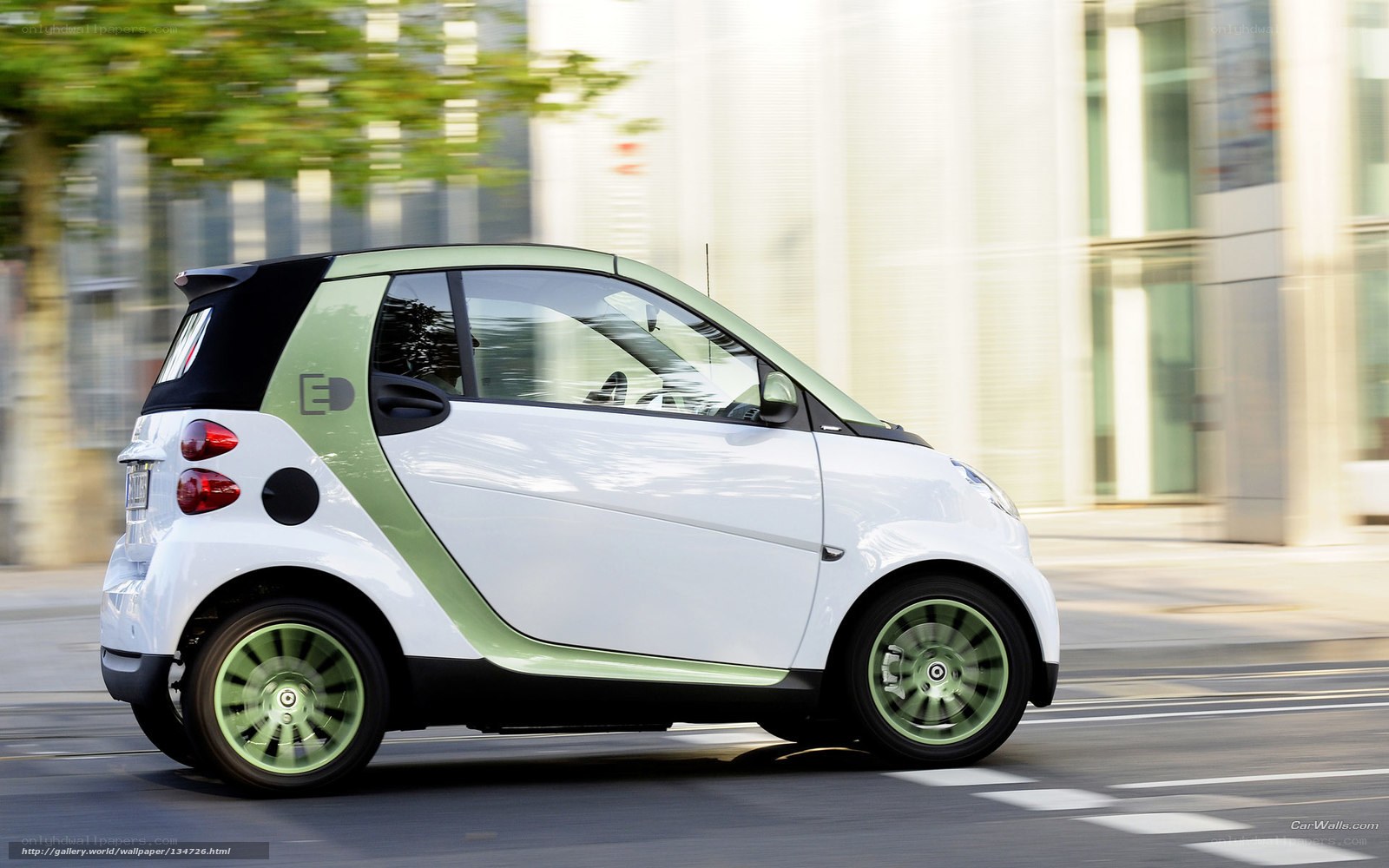 white smart car in motion