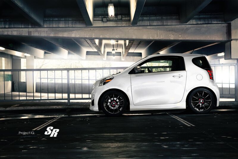 White Smart Car in Parking Garage
