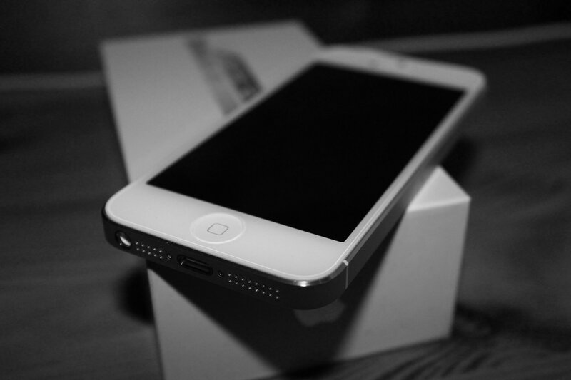 white smartphone on box