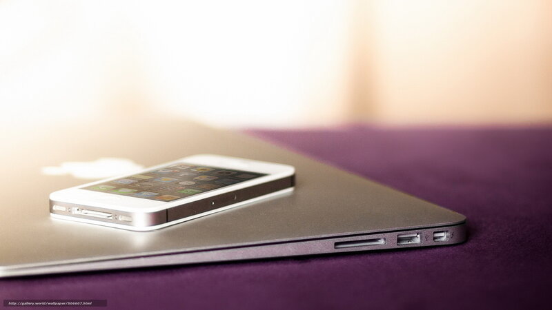 White Smartphone on Laptop