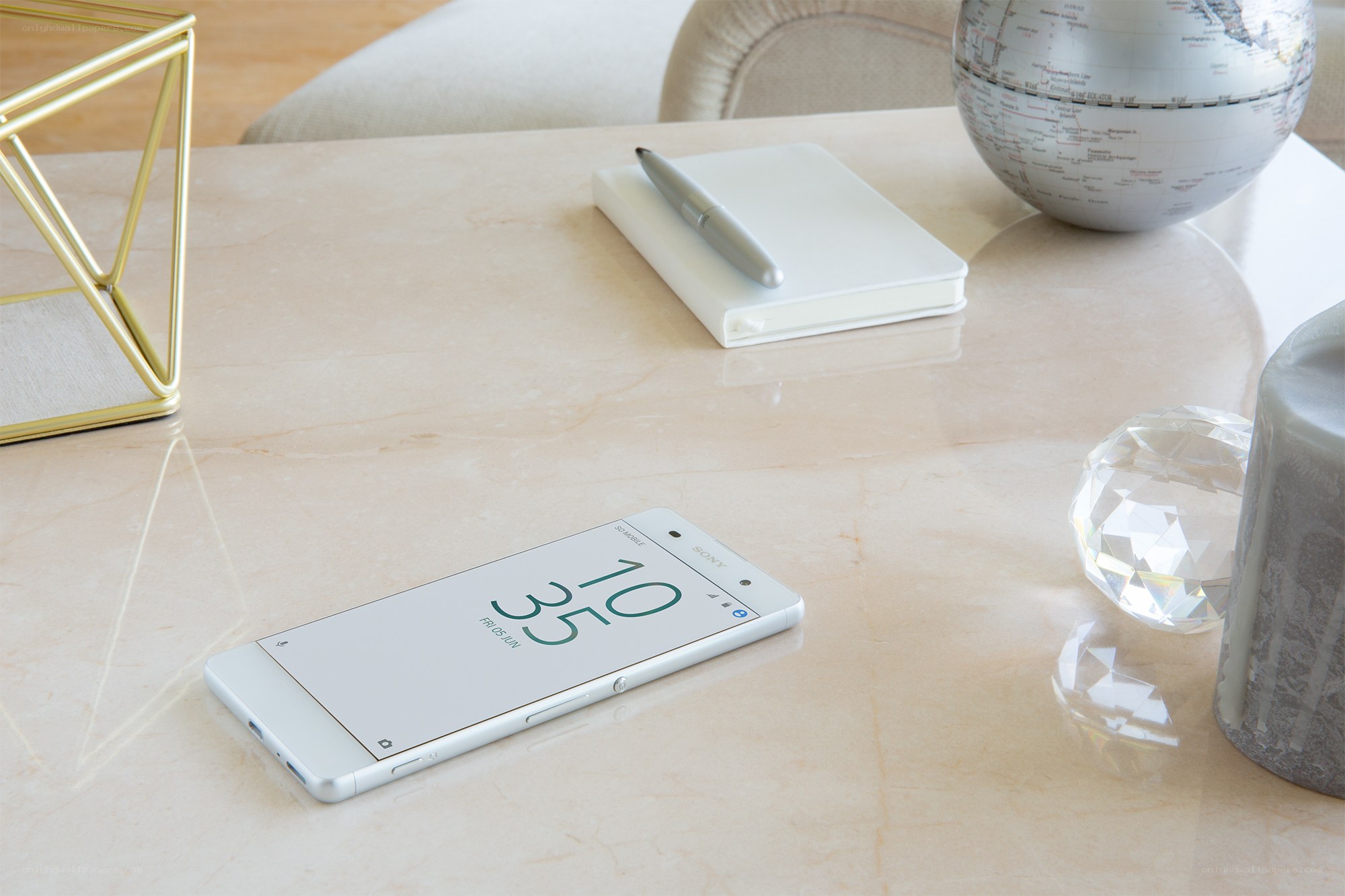White smartphone on marble table