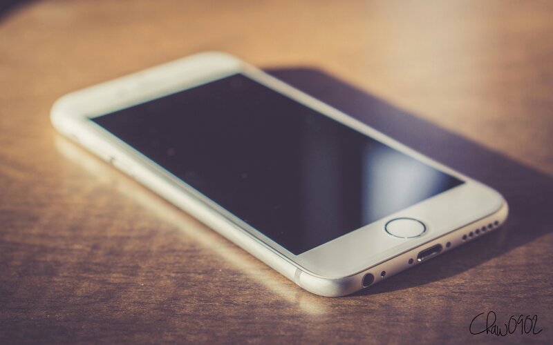 White Smartphone on Table — Brown, Calm