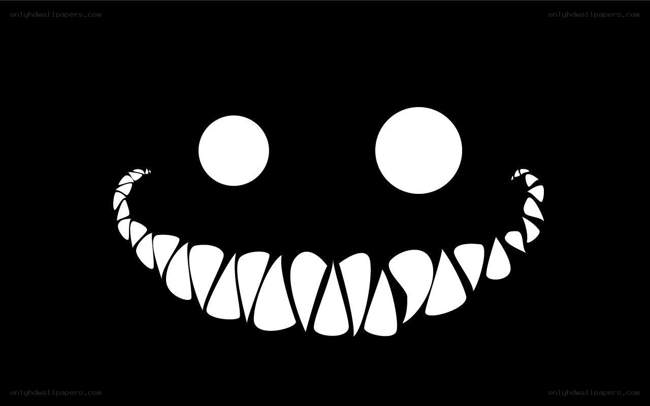 white smile on black background