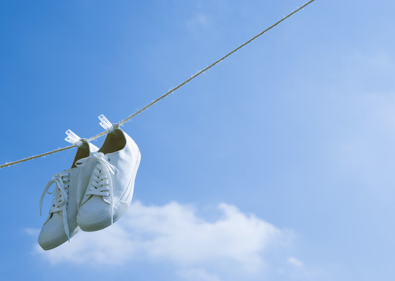 White sneakers on a clothesline
