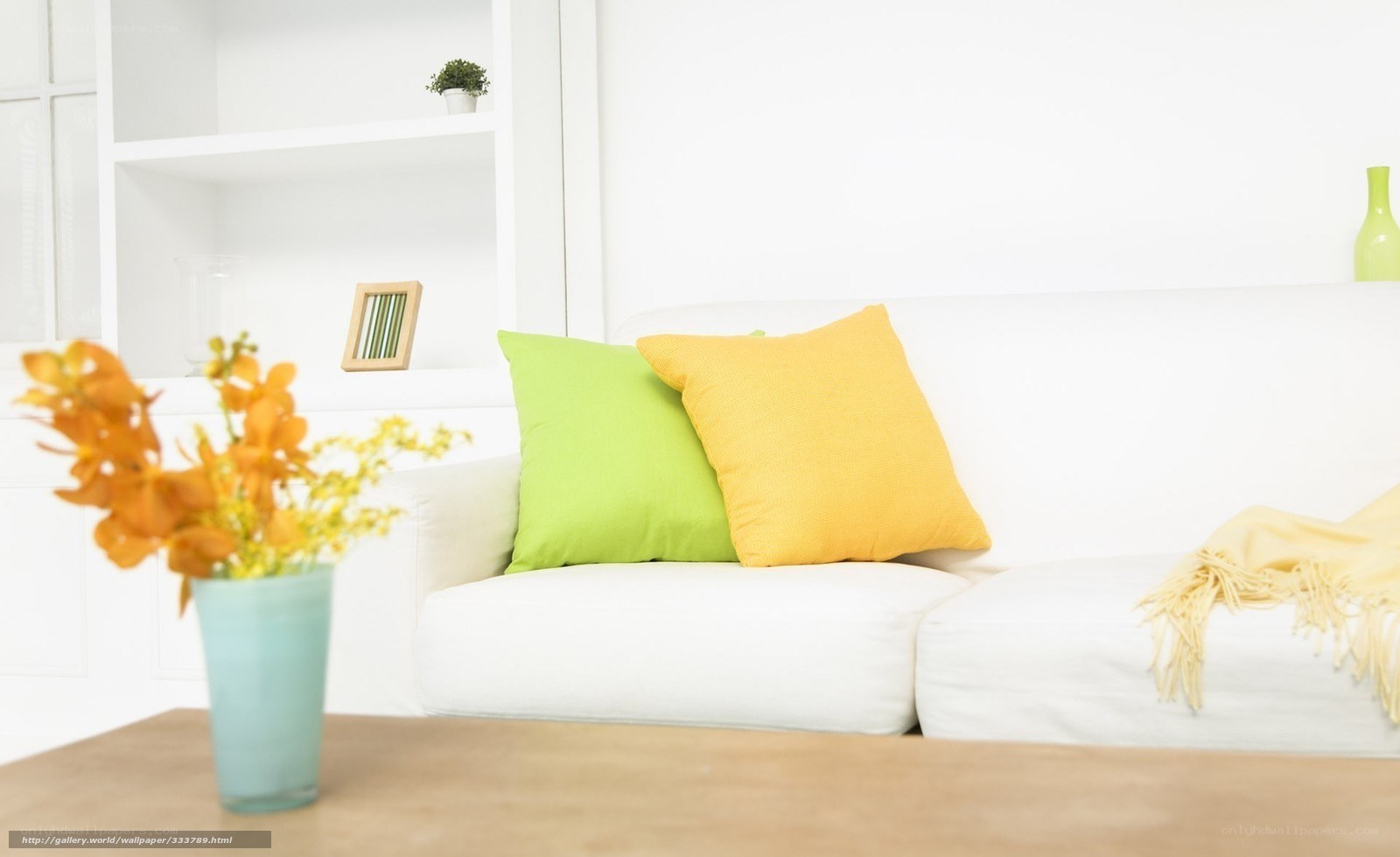 White sofa with colorful pillows