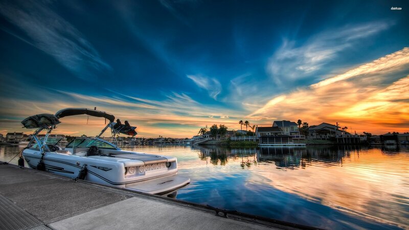 White Speedboat at Dock — Blue