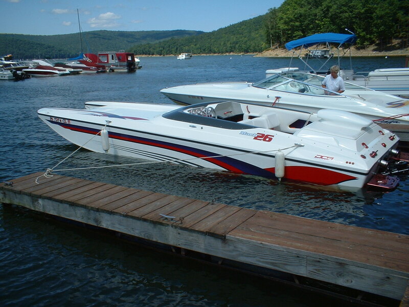White Speedboat at Dock — Calm, Afternoon