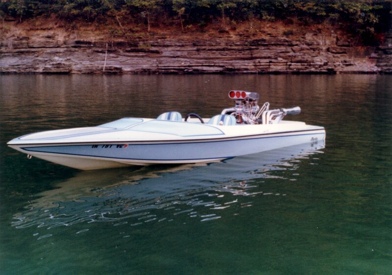 white speedboat on calm water