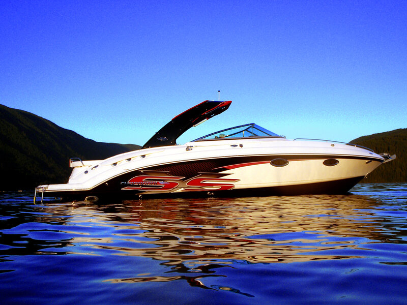 White Speedboat on Water — Blue