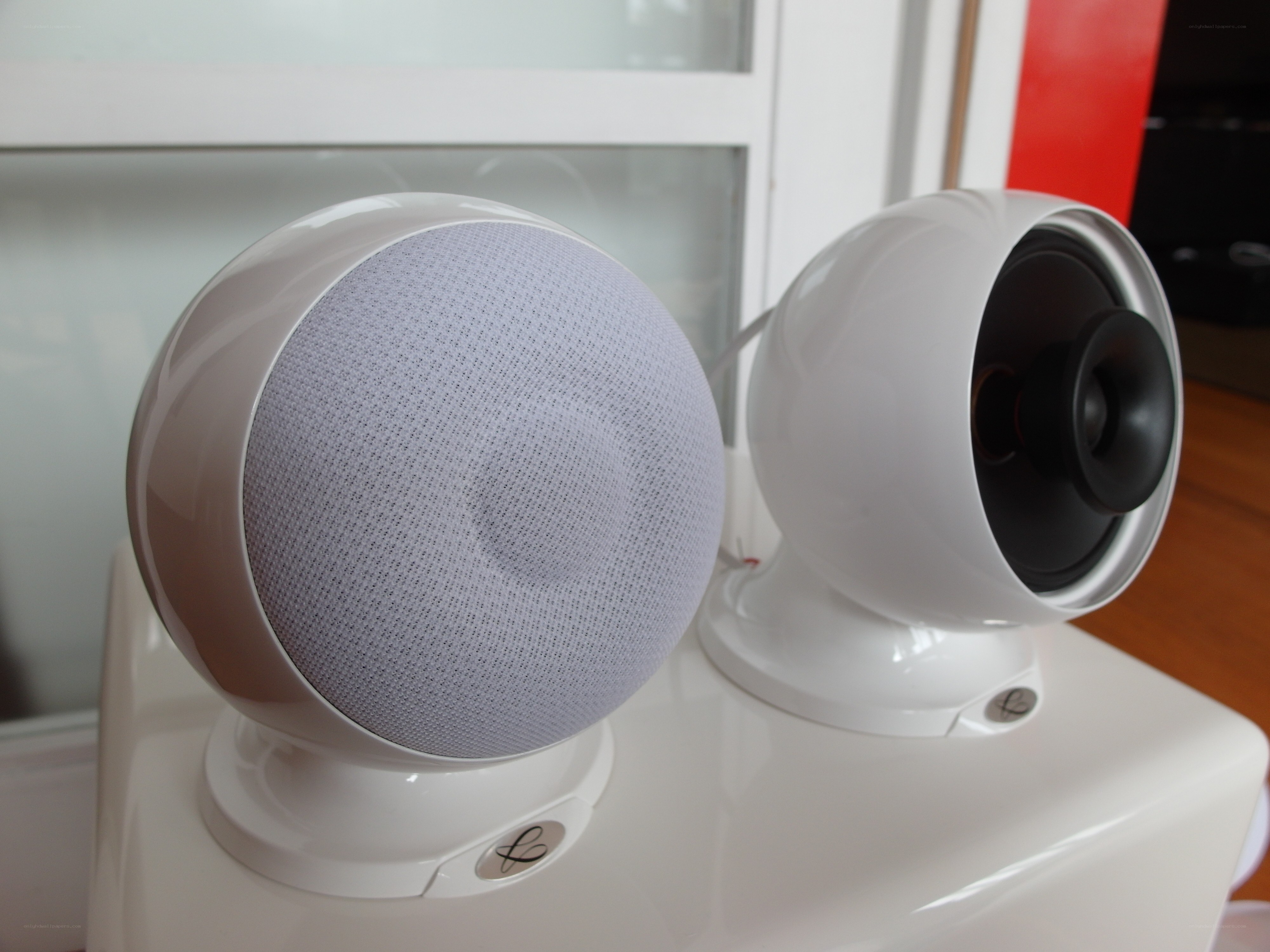 white spherical speakers