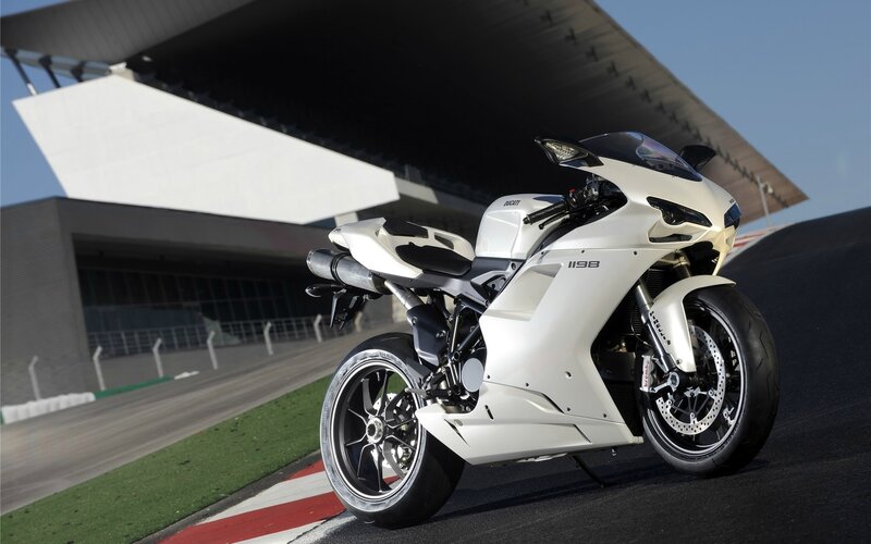 White Sport Motorcycle — Dramatic, Afternoon, Photograph, Racetrack