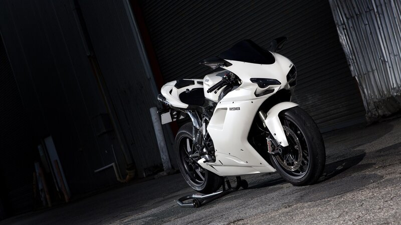 White Sport Motorcycle — Dramatic, Night, Photograph, Motorcycle Stand