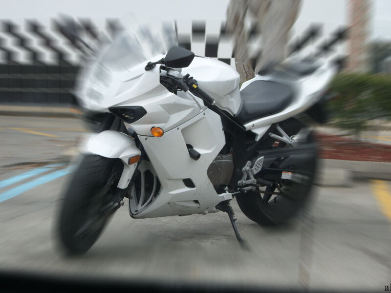White Sport Motorcycle — Motion