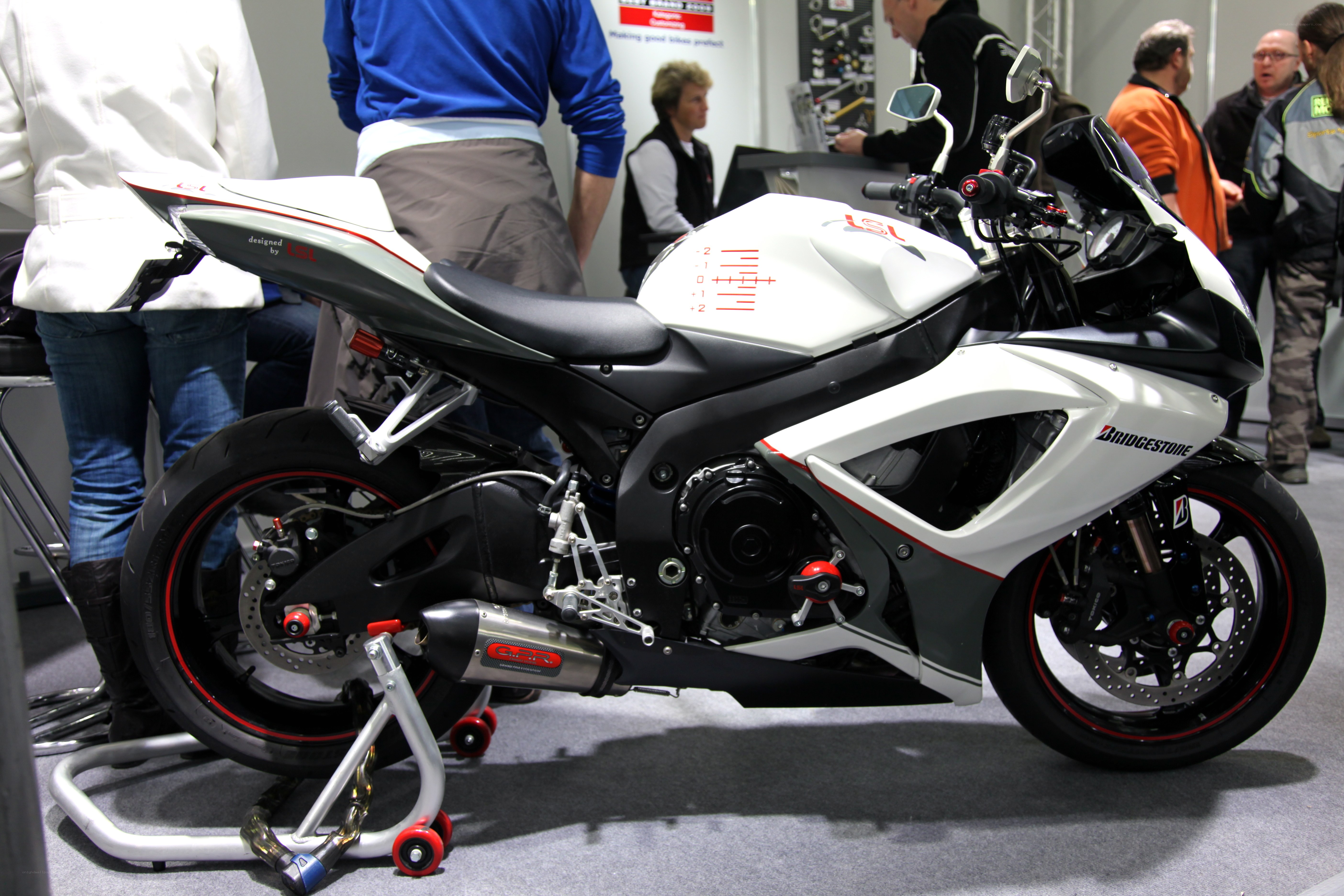 white sport motorcycle on display
