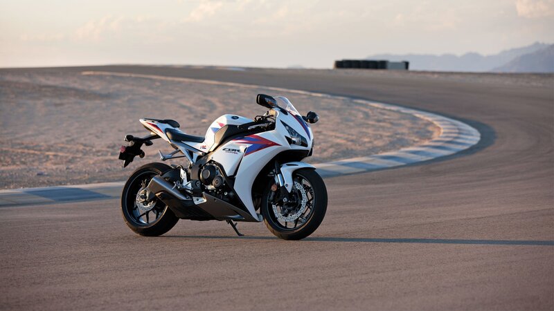 White sport motorcycle on racetrack